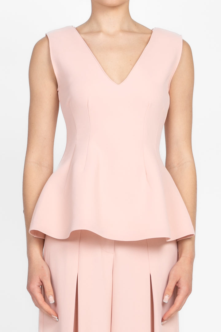 Tensione In - Top peplum con fiore Art. OH874